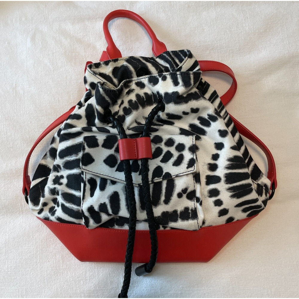 L.A.M.B by Gwen Stefani Gracie Handle Bucket Backpack Black White and Red
